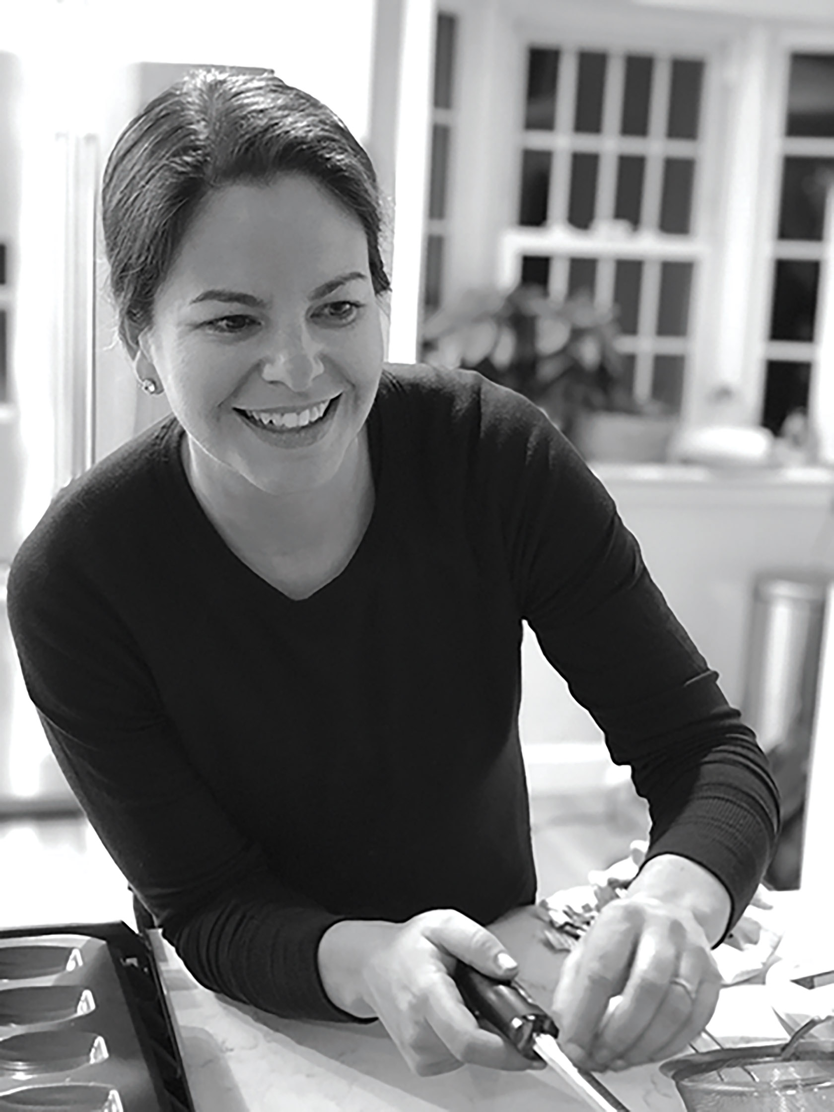 Photo shows Amanda Smallwood baking granola in her kitchen