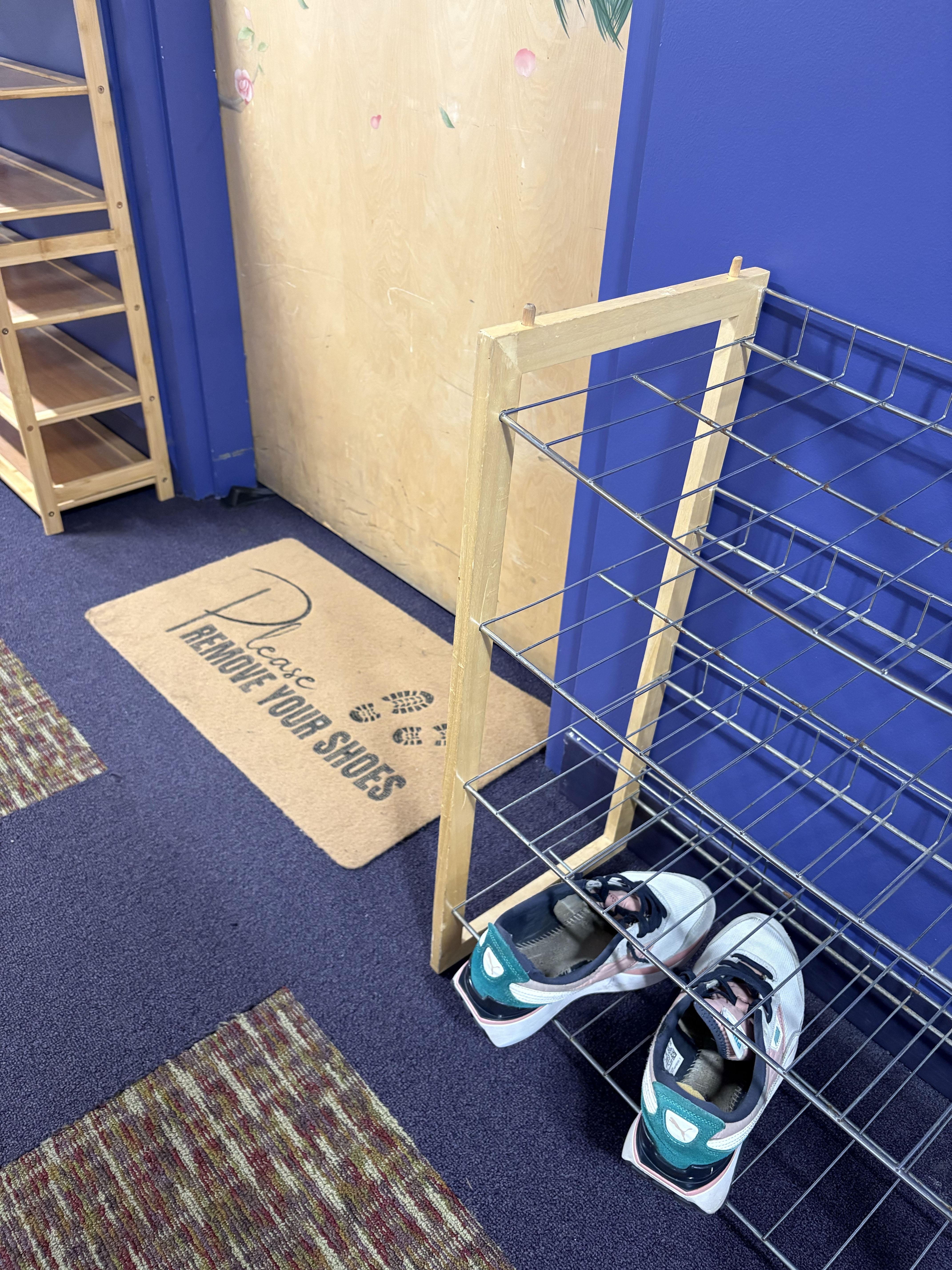 Photo shows shoes outside the prayer room since they take their shoes off before praying