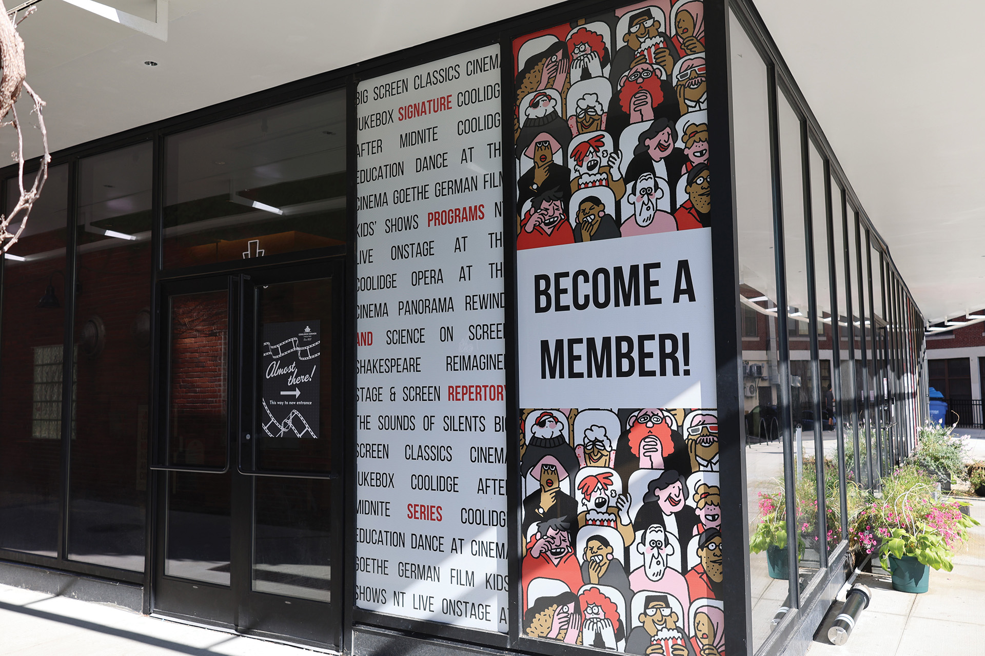 Photo of exterior signage encouraging patrons to become Coolidge Corner Theatre members