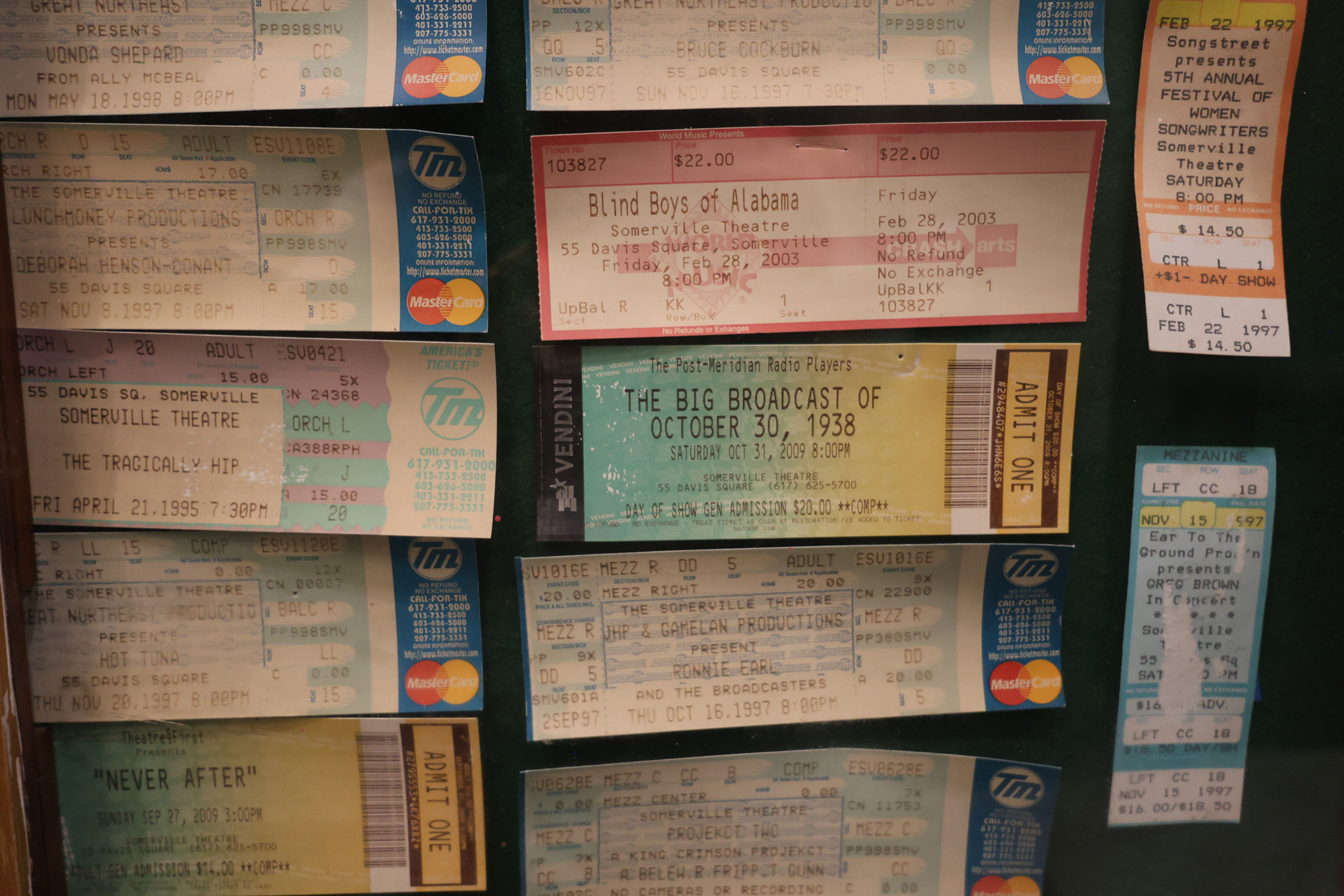 Photo of vintage theater memorabilia and old ticket stubs for the Somerville Theater