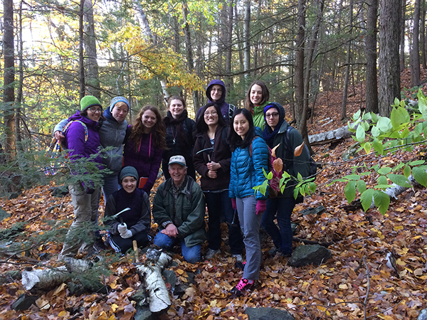 Steve Dunn with his students on a field trip in the woods